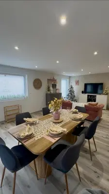 Coin salon dans l'établissement Gîte duplex les Glycines
