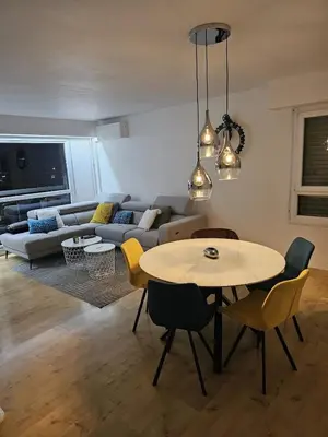 Coin salon dans l'établissement Appartement avec Parking Centre Ville Mulhouse