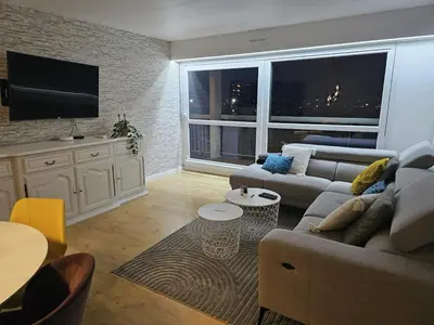 Coin salon dans l'établissement Appartement avec Parking Centre Ville Mulhouse