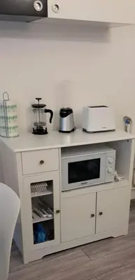 Cuisine ou kitchenette dans l'établissement GabiHome