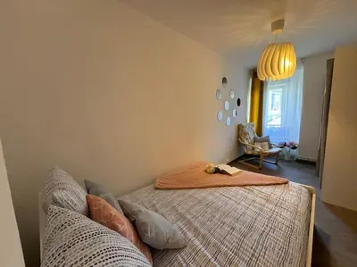 Un ou plusieurs lits dans un hébergement de l'établissement Le JOY, centre ville