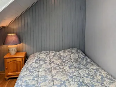 Un ou plusieurs lits dans un hébergement de l'établissement Maison charmante avec jardin, terrasse et parking près du Ballon d'Alsace - FR-1-583-297