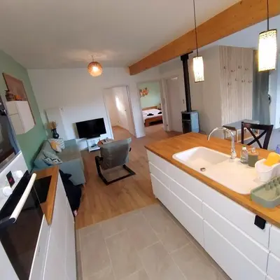 Cuisine ou kitchenette dans l'établissement Charmant Cottage