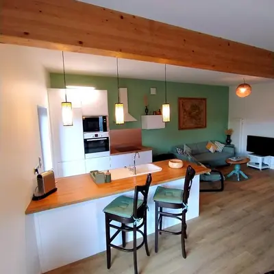 Cuisine ou kitchenette dans l'établissement Charmant Cottage