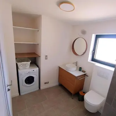 Salle de bains dans l'établissement Charmant Cottage