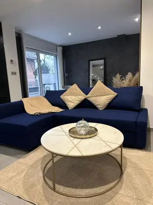 Coin salon dans l'établissement Grand logement proche Colmar au calme parking wifi