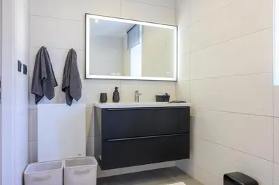Salle de bains dans l'établissement Maison cosy et bien située