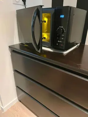 Cuisine ou kitchenette dans l'établissement Le Studio