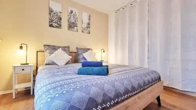Un ou plusieurs lits dans un hébergement de l'établissement Le Petit Léon - Colmar - Fibre - RBNB