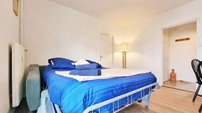 Un ou plusieurs lits dans un hébergement de l'établissement Le Petit Léon - Colmar - Fibre - RBNB