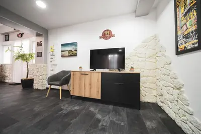 Télévision ou salle de divertissement dans l'établissement Loft moderne en Alsace! Proche Europa Park