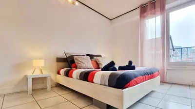 Un ou plusieurs lits dans un hébergement de l'établissement Le Cozy Urbain - Centre - RBNB