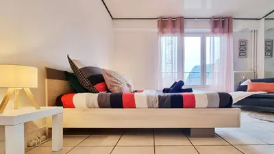 Coin salon dans l'établissement Le Cozy Urbain - Centre - RBNB