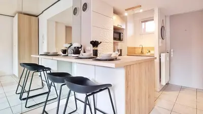 Cuisine ou kitchenette dans l'établissement Le Cozy Urbain - Centre - RBNB