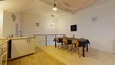 Télévision ou salle de divertissement dans l'établissement Le Nid Caché Mulhouse