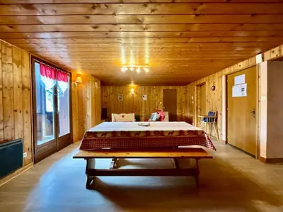 Un ou plusieurs lits dans un hébergement de l'établissement Le Grand Aigle, bel appartement style chalet