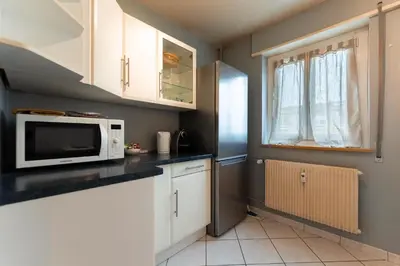 Cuisine ou kitchenette dans l'établissement Chez Margaux - Parking