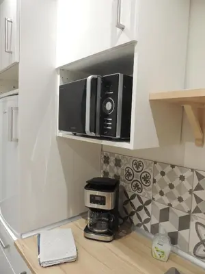 Cuisine ou kitchenette dans l'établissement Logement F1 neuf indépendant