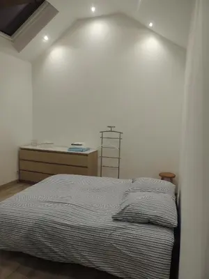 Un ou plusieurs lits dans un hébergement de l'établissement Logement F1 neuf indépendant