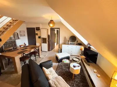 Coin salon dans l'établissement Le Petit Roswag - Parking Gratuit - Proche Gare - Commerces à proximité