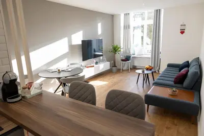 Télévision ou salle de divertissement dans l'établissement FID B' Home, appartement Cosy entre Mulhouse et Colmar