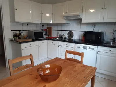 Cuisine ou kitchenette dans l'établissement Spacieux et lumineux T5 avec 4 chambres, au centre-ville de Mulhouse, grand balcon, grand écran plat