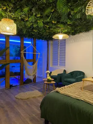Coin salon dans l'établissement Suite Tropicale