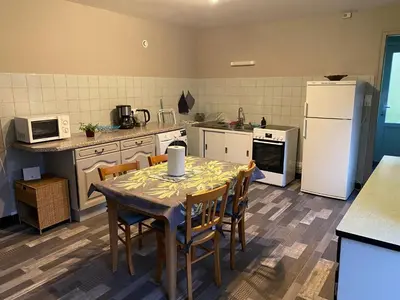 Cuisine ou kitchenette dans l'établissement Le Gîte du Chat Gru