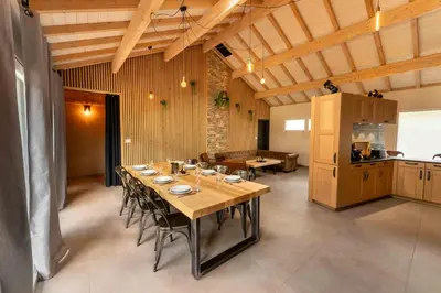 Cuisine ou kitchenette dans l'établissement chalet zélcova et spa Gérardmer