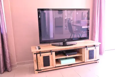 Télévision ou salle de divertissement dans l'établissement La Renardière
