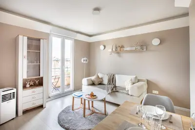 Coin salon dans l'établissement Le Tassigny à 2mn du centre avec Parking