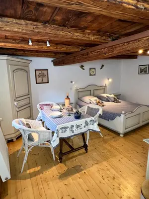 Un ou plusieurs lits dans un hébergement de l'établissement Gîte de la Rivière Enchantée
