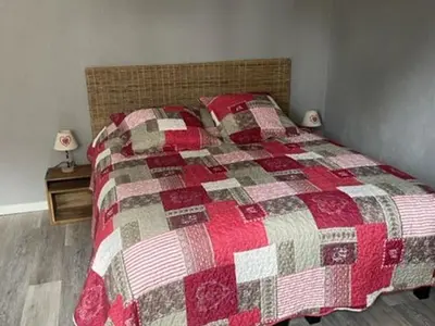 Un ou plusieurs lits dans un hébergement de l'établissement Gîte spacieux à Gérardmer avec vue sur lac, 3 chambres, Wi-Fi et parking - FR-1-589-761