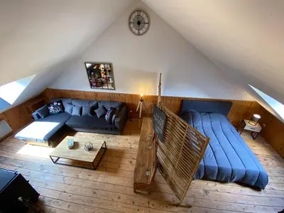 Coin salon dans l'établissement Loft des Cimes - Evasion en montagne avec local vélo privé