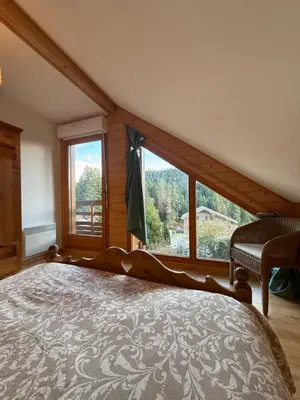Un ou plusieurs lits dans un hébergement de l'établissement Le Chalet des Vanneaux