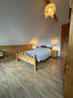 Un ou plusieurs lits dans un hébergement de l'établissement Le Chalet des Vanneaux