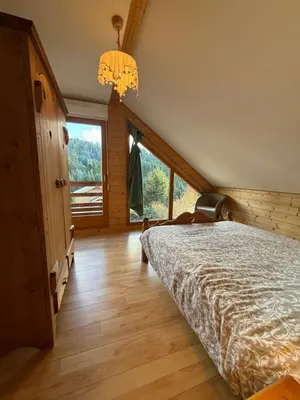 Un ou plusieurs lits dans un hébergement de l'établissement Le Chalet des Vanneaux