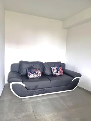 Coin salon dans l'établissement Start appart