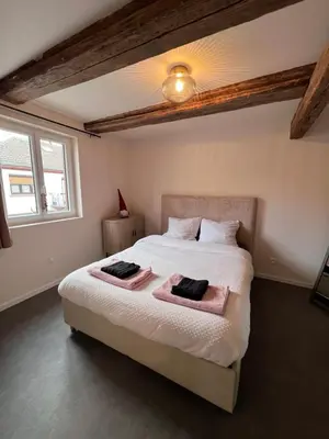 Un ou plusieurs lits dans un hébergement de l'établissement Appartement 1769