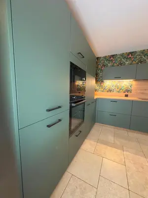 Cuisine ou kitchenette dans l'établissement Logement du 162