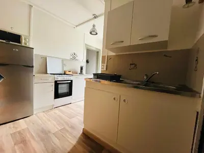 Cuisine ou kitchenette dans l'établissement En prairie