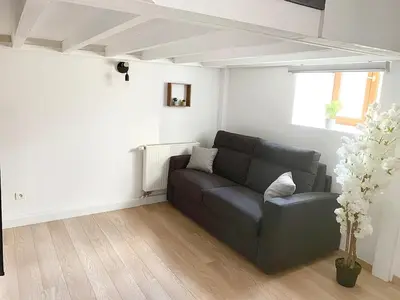 Coin salon dans l'établissement Appartement proche gare