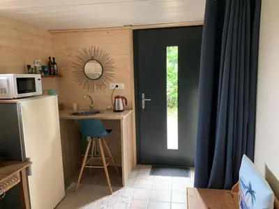 Cuisine ou kitchenette dans l'établissement Espace privé dans un parc arboré