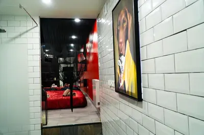 Un ou plusieurs lits dans un hébergement de l'établissement Perle d'eau-Love Room-Jacuzzi-Sauna-Proche Montbéliard et Belfort