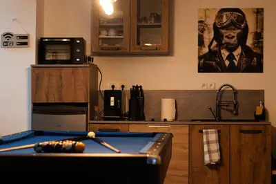 Cuisine ou kitchenette dans l'établissement Perle d'eau-Love Room-Jacuzzi-Sauna-Proche Montbéliard et Belfort
