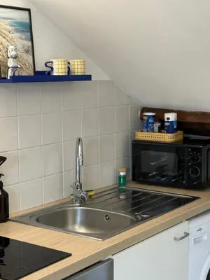 Cuisine ou kitchenette dans l'établissement Sur les toits-Gare-Centre ville-Idéalement situé