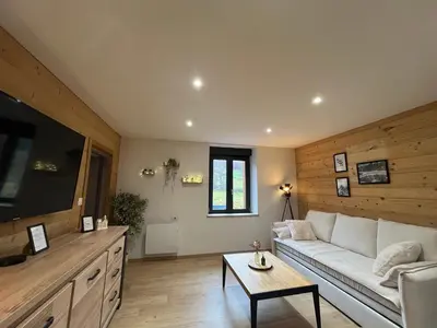 Coin salon dans l'établissement Le Cocon du Brabant - A 6km des pistes