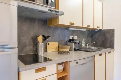 Cuisine ou kitchenette dans l'établissement La Cime des 4 - Vue sur la vallée à La Bresse