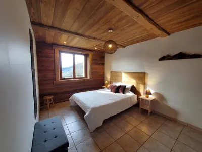 Un ou plusieurs lits dans un hébergement de l'établissement Chalet de la Rougeterre