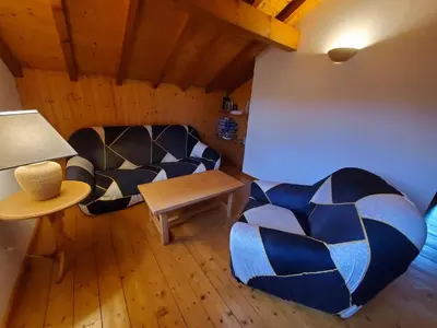 Coin salon dans l'établissement Chalet de la Rougeterre